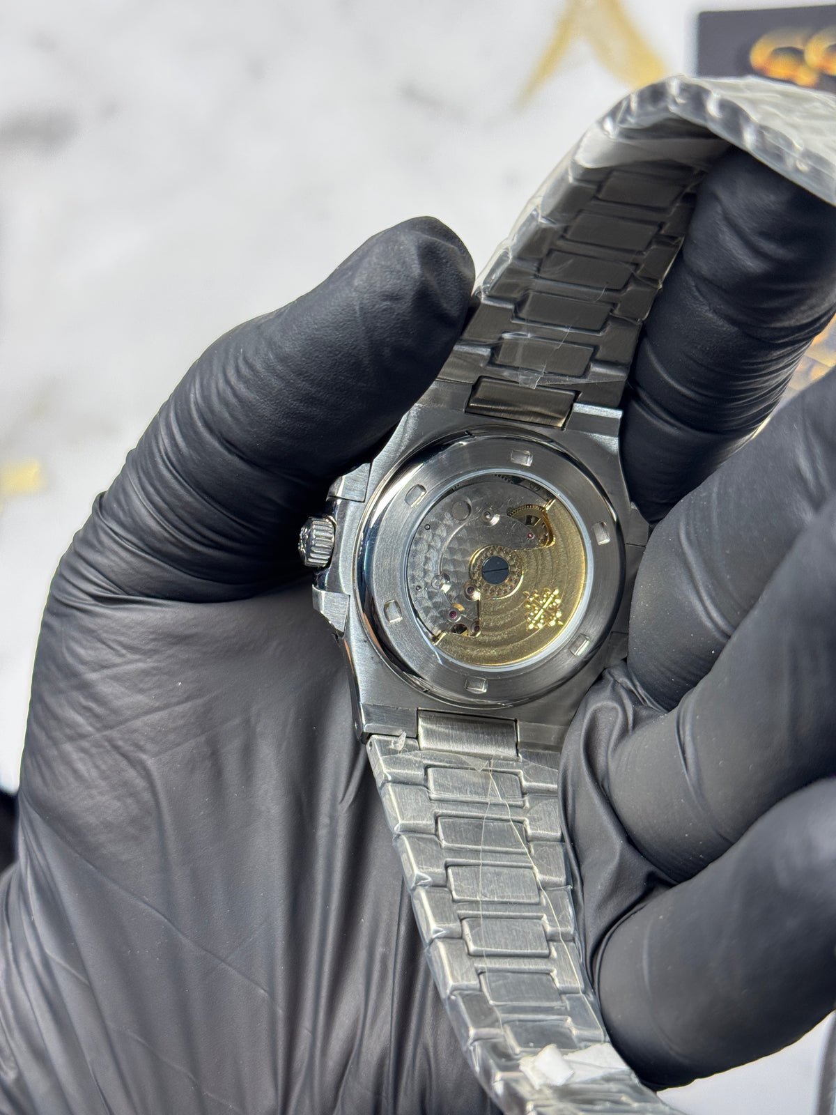 Patek Philippe Nautilus - sunburst olive-green