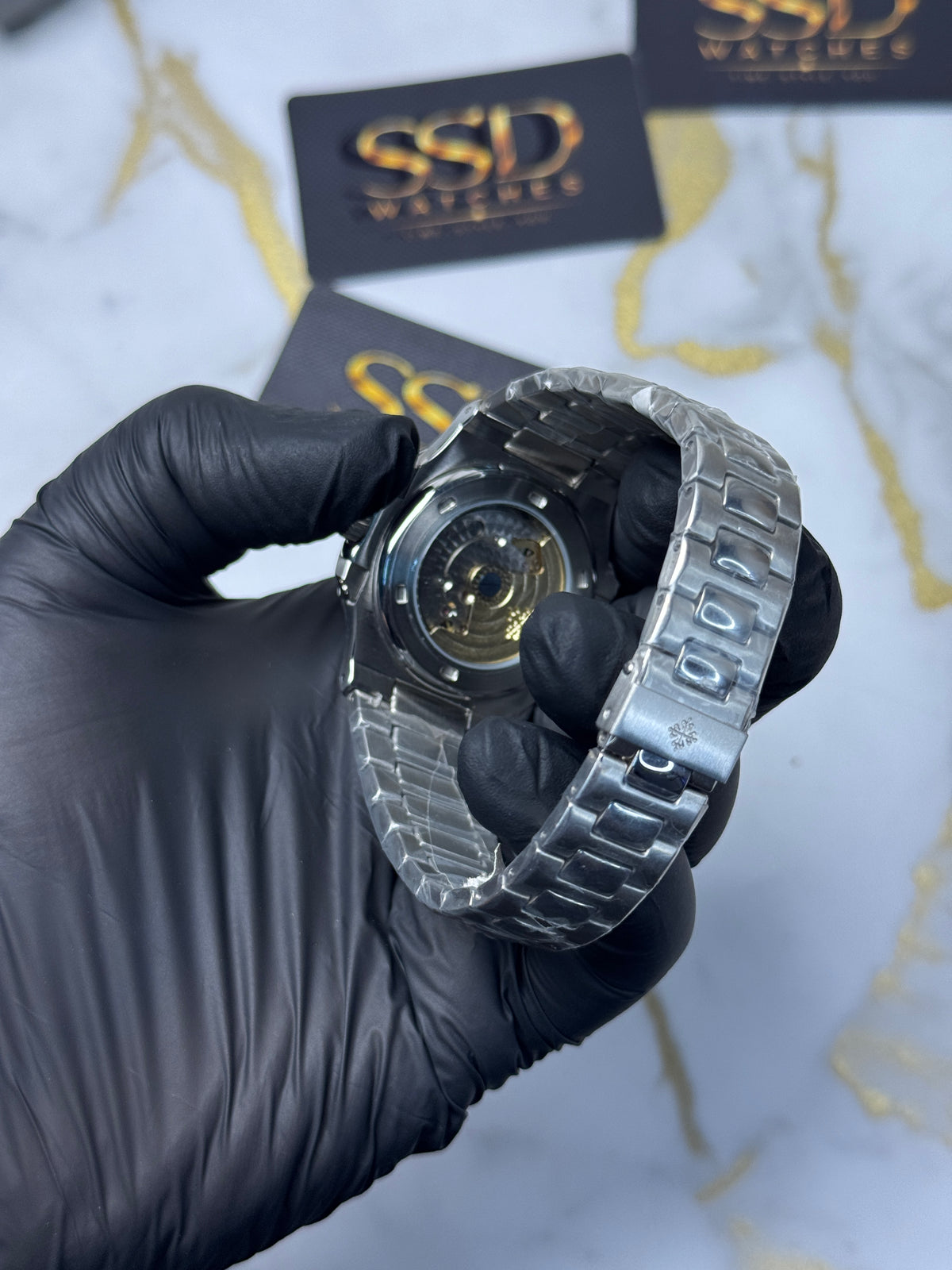 Patek Philippe Nautilus - sunburst olive-green