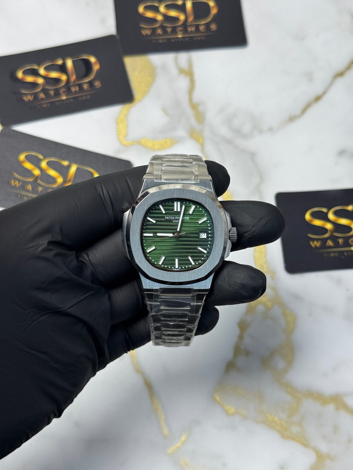 Patek Philippe Nautilus - sunburst olive-green