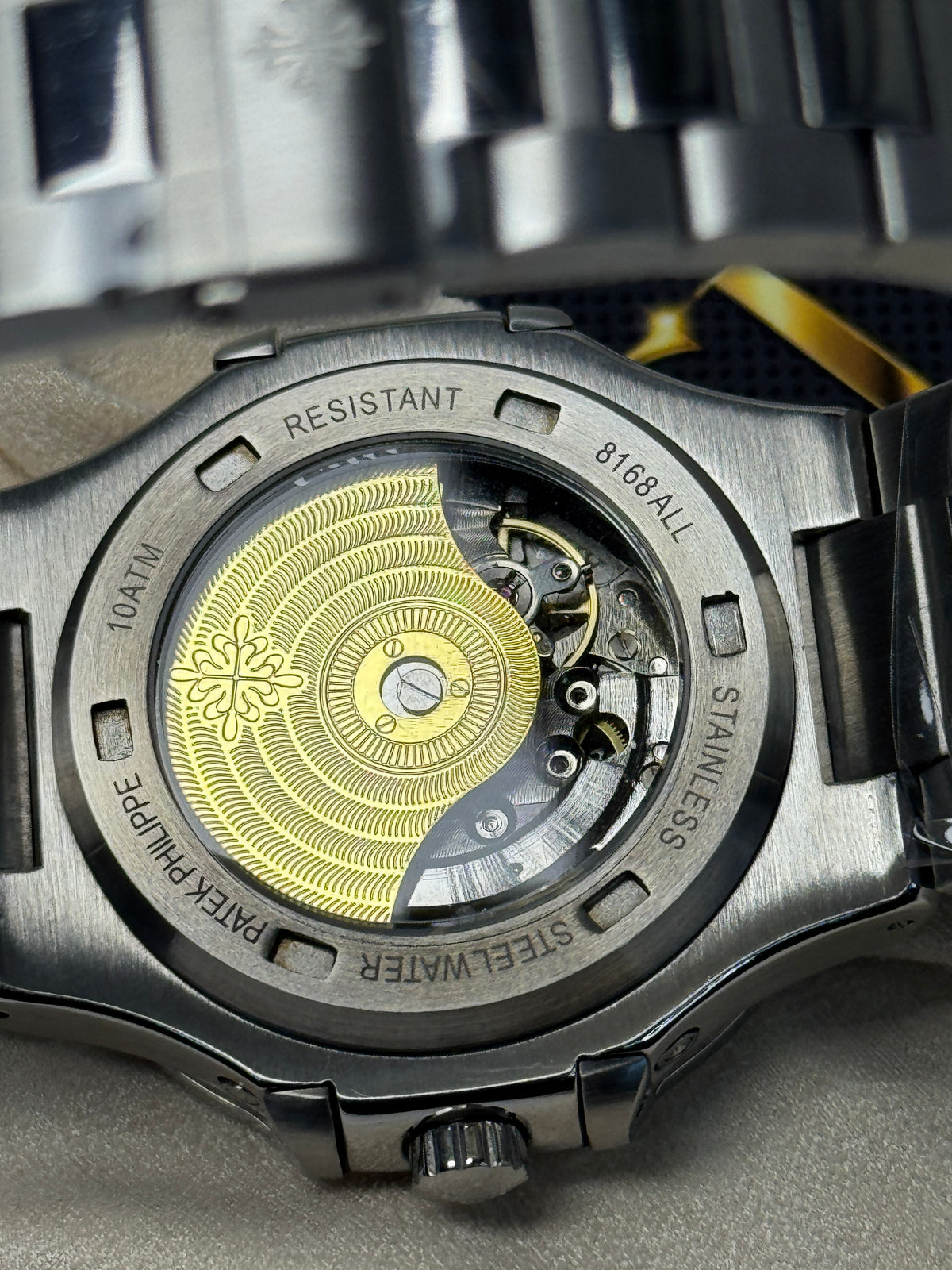 Patek Philippe Nautilus Perpetual Calendar - sunburst blue horizontally embossed dial