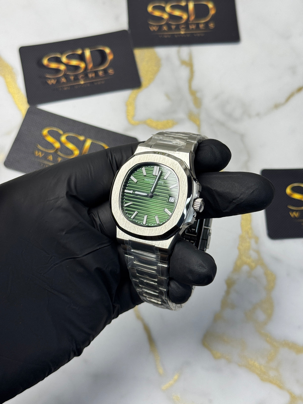 Patek Philippe Nautilus - sunburst olive-green